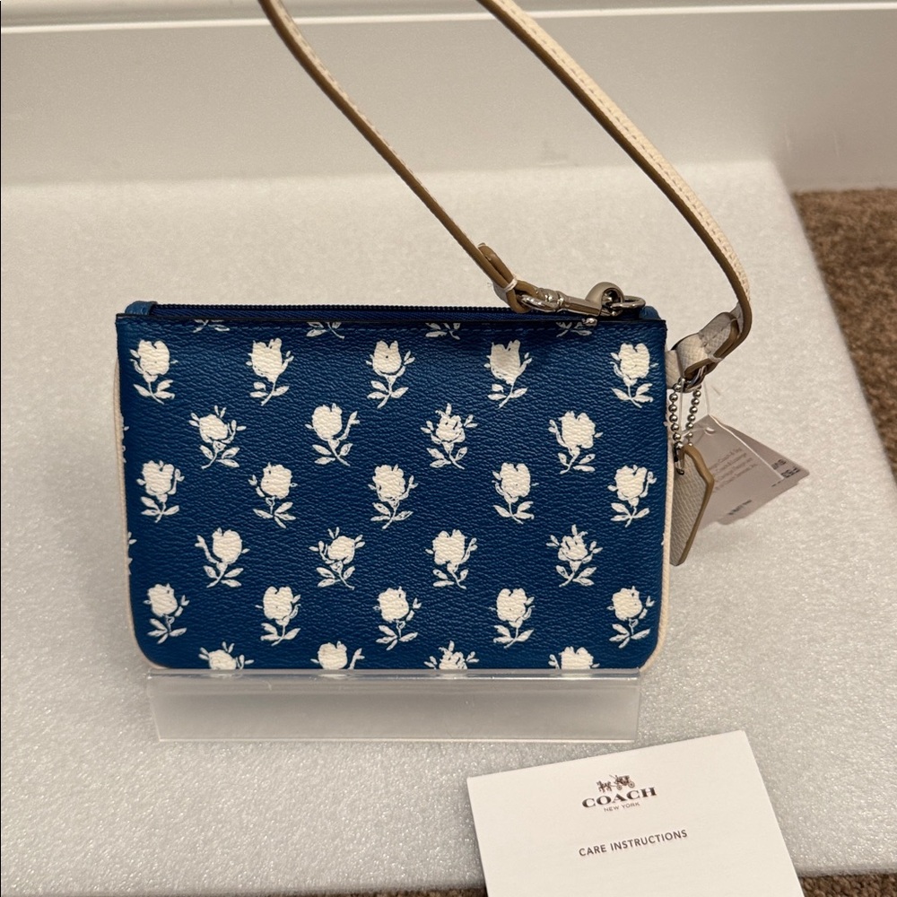 Coach Navy Floral Print Wristlet with Cream Strap - Picture 4 of 6